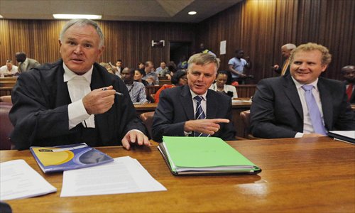 Oscar Pistorius' defense lawyers (left to right) Barry Roux, Brian Webber and Andrew Fancett prepare for the bail application appeal in Pretoria, South Africa on Thursday. Photo: CFP