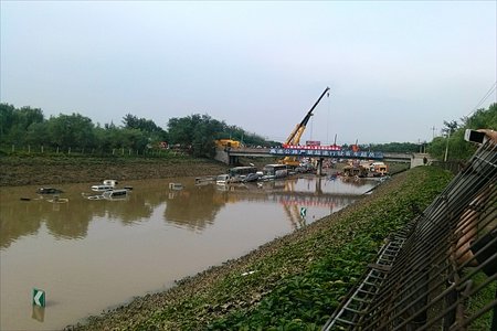 A flooded Beijing expressway after July's torrential rainstorms. Photo: Li Hao