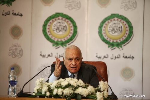 Nabil El-Arabi, secretary general of the Arab League (AL), speaks to the media after the Arab League emergency meeting at the level of permanent delegates to discuss the latest Israeli assaults on Al-Aqsa mosque, one of the three most sacred mosques for Muslims, at the AL headquarters in Cairo, May 12, 2013. (Xinhua/Amru Salahuddien) 