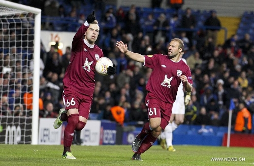 Rubin Kazan's Bebras Natcho (L) celebrates scoring during the UEFA Europa League quarter-final first leg football match against Chelsea in London, capital of Britain, on April 4, 2013. Chelsea won the match 3-1. (Xinhua/Tang Shi) 