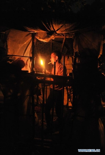 Liu Lingchao cooks in his 