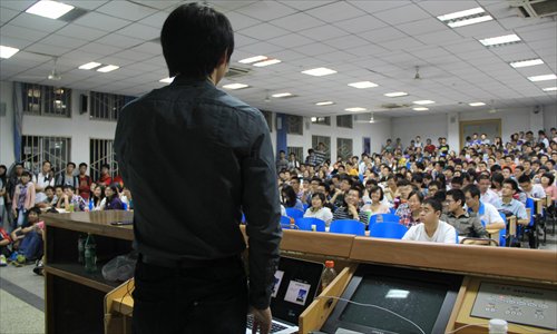 Students from Huazhong University of Science and Technology attend a speech about college life on May 19 in Wuhan, Hubei Province. Photo: IC