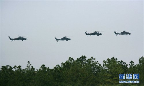 An army aviation brigade under the Nanjing Military Area Command (MAC) of the Chinese People's Liberation Army (PLA) organizes a helicopter flight training, in a bid to temper the tactical skills of the pilots and the helicopter operation-and-control capability. (Xinhua/Guo Weihu)
