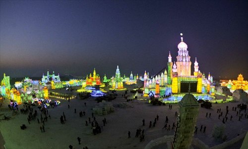 Photo taken on December 23, 2012 shows the night scene of the 29th Harbin International Ice and Snow Festival in Harbin, capital of northeast China's Heilongjiang Province. The festival kicked off at the Harbin Ice and Snow World on Sunday. Photo: Xinhua