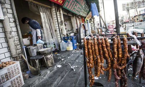 At a Xicheng district restaurant, pickled sausages hang out in the open. Photo: Li Hao/GT
 