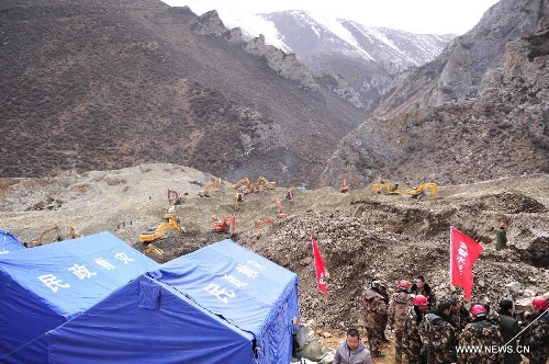 Rescuers work at the accident site in Maizhokunggar County of Lhasa, southwest China's Tibet Autonomous Region, March 31, 2013. Thirteen bodies have been found until 6:30 p.m. Sunday at the site of a mining area landslide. The disaster struck a workers' camp of the Jiama Copper Polymetallic Mine at about 6 a.m. on Friday, burying 83 workers. (Xinhua/Liu Kun) 