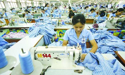 Employees work at a textile mill in Ho Chi Minh City, Vietnam. Photo: CFP