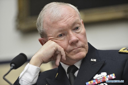 U.S. Chairman of Joint Chiefs of Staff General Martin Dempsey testifies before the House Armed Services Committee during a hearing on the fiscal year 2014 national defense authorization budget request from the Department of Defense, on Capitol Hill in Washington D.C., capital of the United States, April 11, 2013. U.S. President Barack Obama on Wednesday proposed a 526.6-billion-dollar base budget for the Defense Department in fiscal year 2014, as the Pentagon struggles to provide funds for its strategic rebalance to the Asia Pacific amid mandatory budget cuts. (Xinhua/Zhang Jun) 