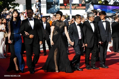 Chinese director Jia Zhangke (3rd R) of the film 