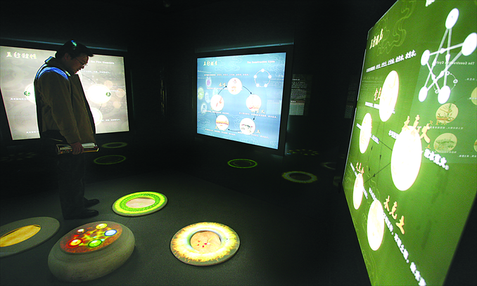 A man visits the hall of the feng shui elements: metal, wood, water, fire and earth, at the Traditional Architecture Feng Shui Museum in Taizhou, Jiangsu Province. The Museum, the first of its kind in China, was officially opened in December 2010. Photo: CFP