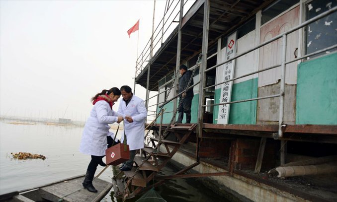 He welcomes his wife when she returns home after house calls to patients. Photo: CFP