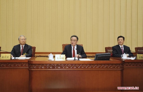 &nbsp;Wu Bangguo (C), chairman of the National People's Congress (NPC) Standing Committee, presides over the closing ceremony of the 31st session of the 11th NPC Standing Committee in Beijing, capital of China, Feb. 27, 2013. (Xinhua/Xie Huanchi)  