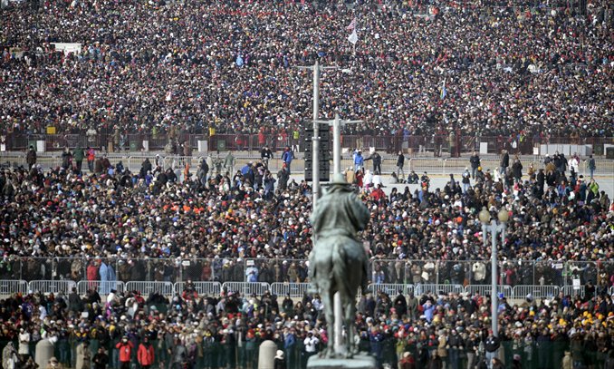 People crowd the National Mall to view US President Barack Obama taking the oath of office during the 57th Presidential Inauguration ceremonial swearing-in at the US Capitol on Monday in Washington, DC. Photo: AFP