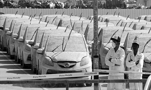 Honda scraps 1,000 floodravaged cars in Thailand Global Times