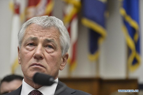 U.S. Secretary of Defense Chuck Hagel testifies before the House Armed Services Committee during a hearing on the fiscal year 2014 national defense authorization budget request from the Department of Defense, on Capitol Hill in Washington D.C., capital of the United States, April 11, 2013. U.S. President Barack Obama on Wednesday proposed a 526.6-billion-dollar base budget for the Defense Department in fiscal year 2014, as the Pentagon struggles to provide funds for its strategic rebalance to the Asia Pacific amid mandatory budget cuts. (Xinhua/Zhang Jun) 