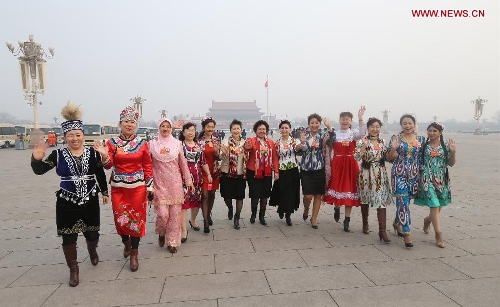 Deputies to the 12th National People's Congress (NPC) pose for a photo at the Tian'anmen Square in Beijing, capital of China, March 17, 2013. The closing meeting of the first session of the 12th NPC will be held in Beijing on Sunday. (Xinhua/Xing Guangli)