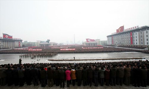 Military officers, soldiers and civilians gather to celebrate the successful launch of the Kwangmyongsong-3 satellite in Pyongyang, capital of the Democratic People's Republic of Korea (DPRK), on Dec. 14, 2012. According to the DPRK's official media KCNA, a Unha-3 rocket carrying the second version of the Kwangmyongsong-3 satellite blasted off from the Sohae Space Center in Cholsan County, North Phyongan Province, on Dec. 12. Photo: Xinhua
