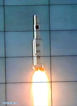 Photo released by the official KCNA news agency of the Democratic People's Republic of Korea (DPRK) on December 12, 2012 shows the Unha-3 carrier rocket launching with the satellite Kwangmyongsong-3, on a monitor screen at the satellite control center. According to the KCNA, the second version of Kwangmyongsong-3 was launched by an Unha-3 carrier rocket at 9:49 a.m. local time (0049 GMT) Wednesday from the Sohae Space Center in Cholsan County, North Phyongan Province, and entered the preset orbit. Photo: Xinhua