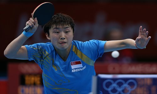 Singapore's Feng Tianwei, born in China, competes during her women's singles table tennis third round match on Sunday. Photo: CFP