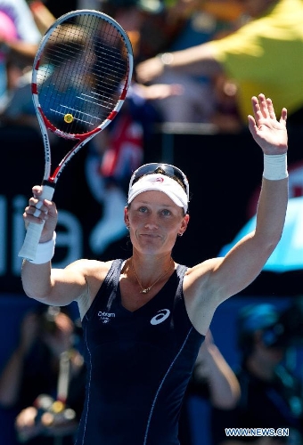 Samantha Stosur of Australia celebrates during her first round women's singles match against Chang Kai-Chen of Chinese Taipei on the first day of 2013 Australian Open tennis tournament in Melbourne, Australia, Jan. 14, 2013. Samantha Stosur won 2-0 to enter the next round. (Xinhua/Bai Xue) 