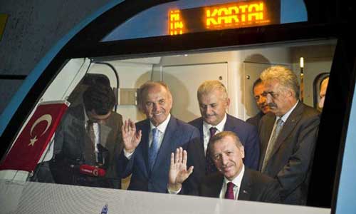 Turkish Prime Minister Recep Tayyip Erdogan drives the metro cart to inaugurate the first metro line on the Asian side of Istanbul on Aug. 17, 2012. Photo: Xinhua