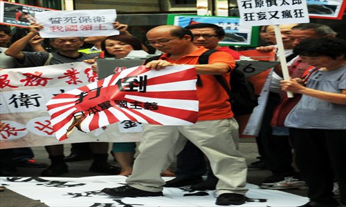Pro-China activists rally during an anti-Japan protest in Hong Kong on Saturday.Photo: AFP
