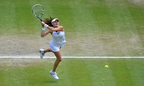 Agnieszka Radwanska plays a shot during the match. Photo: AFP