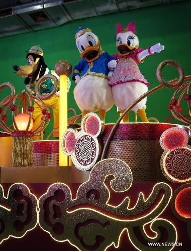 A Disneyland float which will attend the 2013 Cathay Pacific International Chinese New Year Night Parade is displayed at a press preview in south China's Hong Kong, Feb. 4, 2013. The 2013 Cathay Pacific International Chinese New Year Night Parade will take place in Hong Kong on Feb. 10. (Xinhua/Li Ying)&nbsp; 