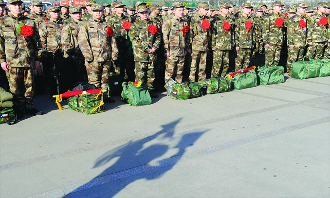 New recruits line up at a farewell ceremony at Taiyuan Station in Shanxi Province on December 11, 2011. Photo: CFP