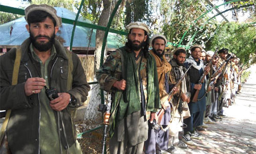 Taliban militants attend a surrender ceremony in Kunar province, eastern Afghanistan, Feb. 11, 2013. Up to 18 Taliban militants renounced violence and surrendered in eastern Afghan province of Kunar on Monday, authorities said. Photo: Xinhua