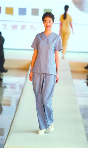 This month, Beijing's 21 hospitals have started replacing the old blue and white striped gowns with newly-designed ones. Photo: CFP