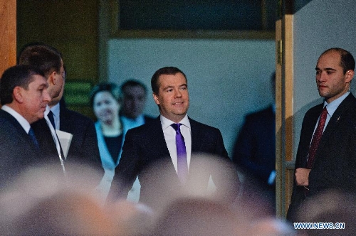 Russian Prime Minister Dmitry Medvedev (C) attends the Gaidar forum in Moscow, Russia, Jan. 16, 2013. Participation in the BRICS was the most promising route for Russia's integration into the global economy, Prime Minister Dmitry Medvedev said Wednesday at the ongoing Gaidar forum. (Xinhua/Jiang Kehong)