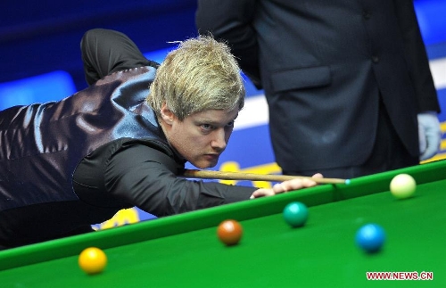 Neil Robertson of Australia competes during the quarter-final against Mark Selby of England at the Haikou World Open snooker tournament in Haikou, capital of south China's Hainan Province, March 1, 2013. Neil Robertson won 5-3. (Xinhua/Guo Cheng) 