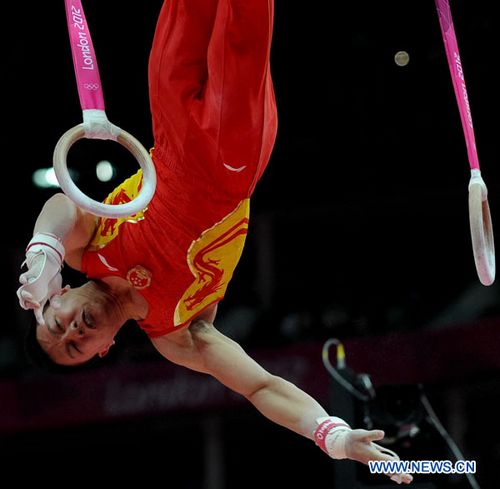 Chen Yibing of China competes in Rings event during Gymnastics Artistic men's team final contest, at London 2012 Olympic Games in London, Britain, on July 30, 2012. The Chinese team won gold medal. Photo: Xinhua