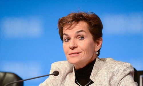 United Nations Framework Convention on Climate Change (UNFCCC) Executive Secretary Christiana Figueres attends a joint press conference at the Qatar National Convention Center (QNCC) in Doha, Qatar, December 8, 2012. UN climate talks in Doha adopted Saturday a package of drafts of low-ambitious second period of Kyoto Protocol and weak commitment on climate finance after overnight negotiations on differences between developed and developing countries. Photo: Xinhua