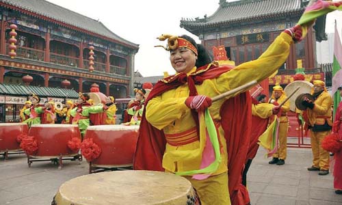 Folk artists perform at a local event celebrating Chinese Lunar New Year, or Spring Festival, in Tianjin, north China, Feb. 10, 2013. Various activities were held all over China on Sunday to celebrate the Spring Festival, marking the start of Chinese lunar Year of the snake. The Spring Festival falls on Feb. 10 this year. Photo: Xinhua