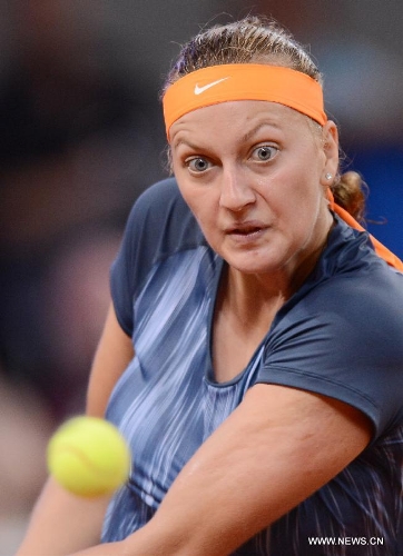 Petra Kvitova of the Czech Republic returns the ball during the first round match of Porsche Tennis Grand Prix against Annika Beck of Germany in Stuttgart, Germany on April 24, 2013. Petra Kvitova won 2-1. (Xinhua/Ma Ning) 
