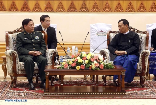 Speaker of the House of Representatives of Myanmar U Shwe Mann (R) meets with visiting Deputy Chief of General Staff of the Chinese People's Liberation Army Qi Jianguo in Nay Pyi Taw, capital of Myanmar, on Jan. 20, 2013. Qi jianguo arrived here Saturday for the first China-Myanmar strategic security consultation. (Xinhua/U Aung) 