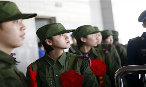 Fresh recruits for the PLA set out on their big adventure. Photo: CFP