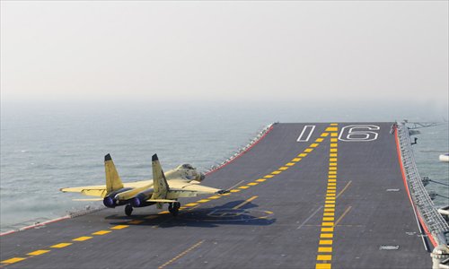 Photo shows carrier-borne J-15 fighter jet taking off from China's first aircraft carrier, the Liaoning. Photo: mil. cnr.cn