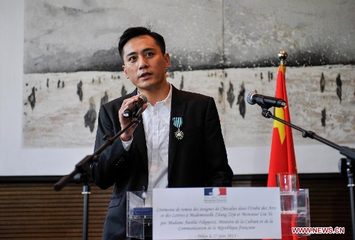 Actor Liu Ye delivers a speech after he was awarded the Order of Arts and Letters by the French government in Beijing, capital of China, June 27, 2013. Established in 1957, the order is the recognition of significant contributions to the arts and literature. (Xinhua/Pan Chaoyue) 