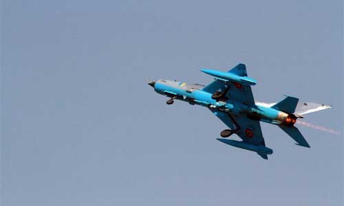 A MIG 21 of Romanian Air Forces performs an air demonstration at the Bucharest International Air Show & General Aviation Exhibition (BIAS 2012) at the Bucharest Baneasa-Aurel Vlaicu International Airport in Bucharest, capital of Romania, July 21, 2012. Photo: Xinhua