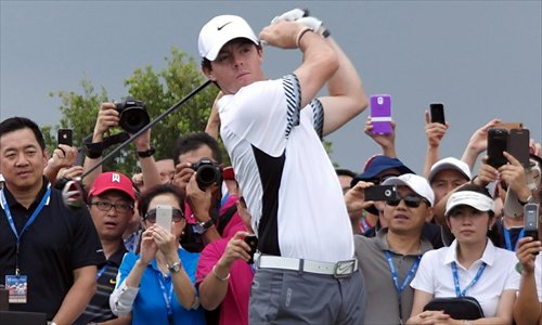 Rory McIlroy plays during an exhibition match against Tiger Woods in South China's Hainan Province on Monday. Photo: IC