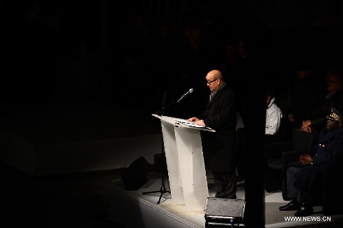 French Defense Minister Jean-Yves Le Drian speaks during the opening ceremony of the 2nd International Military Sports Council (CISM) World Winter Games at Annecy, France, March 25, 2013. (Xinhua/Wang Siwei) 