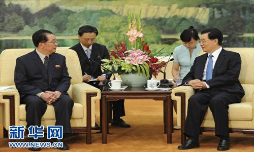 Chinese President Hu Jintao met with a DPRK delegation headed by Jang Song Thaek, chief of the central administrative department of the Workers' Party of Korea (WPK), on Friday. Photo: Xinhua