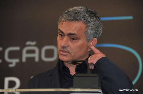 Real Madrid coach Jose Mourinho speaks at a press conference as he attends 