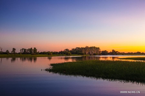 Photo taken on May 25, 2013 shows a view of the Kakadu National Park of Australia. The Kakadu National Park is a protected area in the northern area of Australia. The cultural and natural values of the Kakadu National Park were recognized internationally when the park was inscribed onto the UNESCO World Heritage List. (Xinhua/Qian Jun)