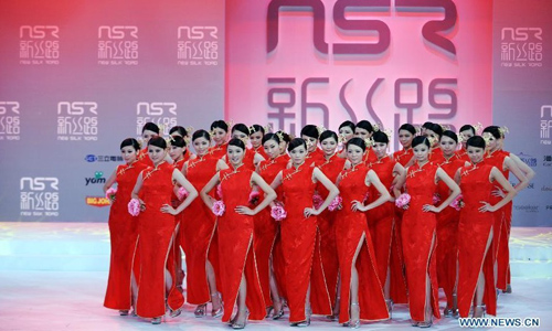 Contestants take part in the 2012 New Silk Road Taiwan Model Contest in Taipei, Southeast China's Taiwan, August 25, 2012. Forty-nine models competed for crowns in Saturday's contest. The winners will be qualified for the 2012 New Silk Road World Model Contest. Photo: Xinhua
