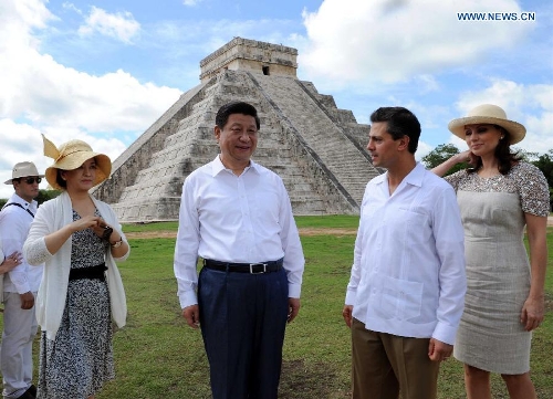 Chinese President Xi Jinping, accompanied by Mexican President Enrique Pena Nieto, visits Chichen Itza, an archaeological site of the Maya civilization in the Mexican state of Yucatan, June 6, 2013. (Xinhua/Rao Aimin) 