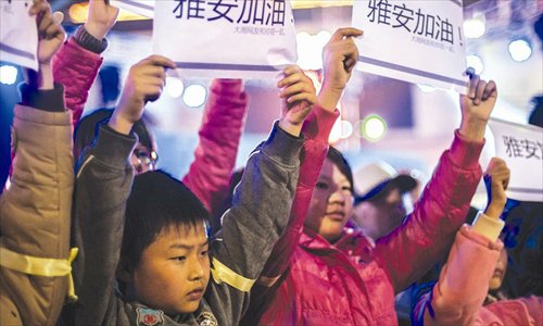 Citizens in Changsha of Hunan Province send their best hopes to Ya'an on Saturday. Photo: CFP